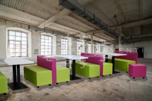 Modular sofa with wooden structure and tables